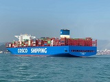A container ship leaves port