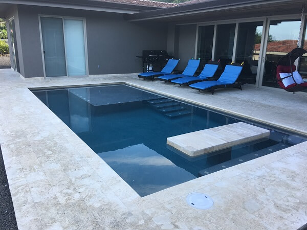 Pool with baja shelf and table.