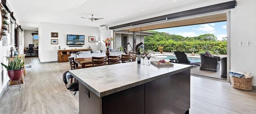 The great room of our Costa Rica home and opening to the pool area.