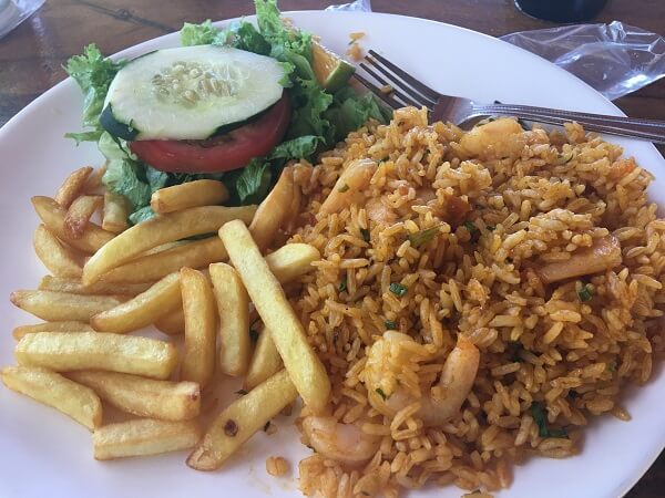 Estero Azul'a shrimp, rice, crunchy french fries and crisp salad.