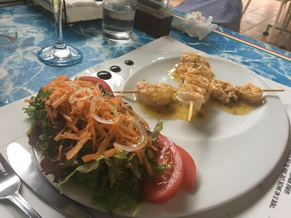 Fresh shrimp sauteed with garlic and butter along with a very fresh side salad.