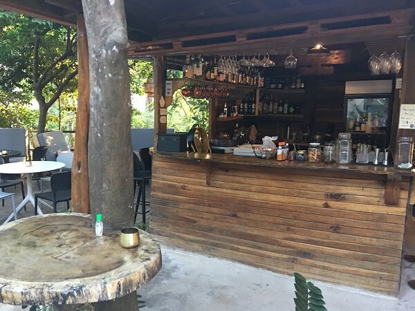 Gracia La Vid's main bar area is located between the outdoor and indoor dining areas.