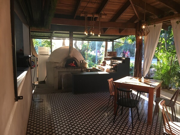 Gracia La Vid's outdoor pizza oven next to the main dining area.