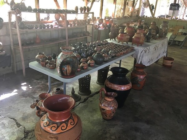 A large selection of beautiful and colorful Guaitil pottery of all different sizes and shapes.