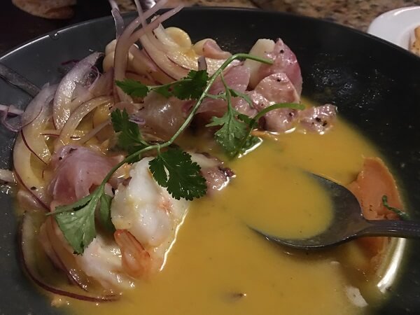 La Divina Comida ceviche with white fish, cilantro, onions, sweet potatoes and spices.