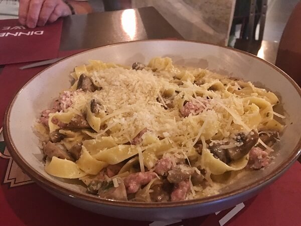 Sweet sausage, peppers and mushroom mixed with Linguine and topped with parmesan chesse.