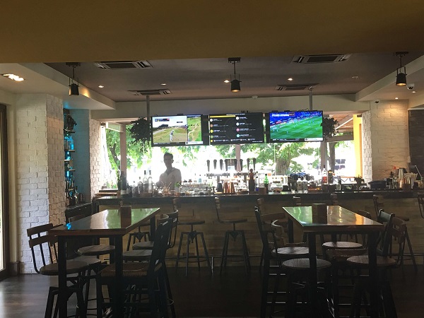 Numu's bar area with live sports.