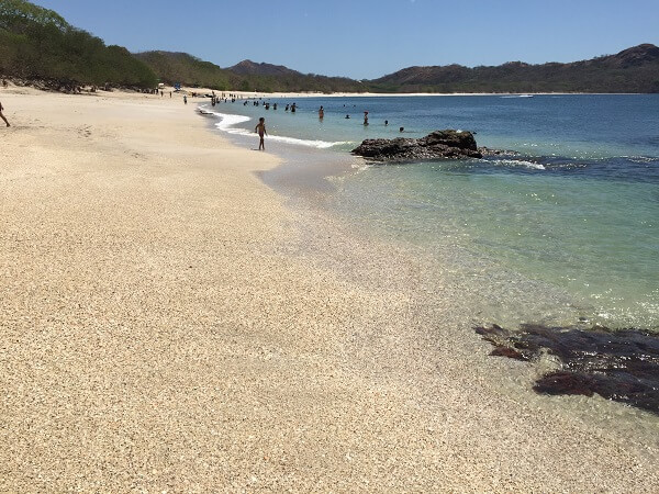 View from the northern end of Playa Conchal looking south toward Puerto Viejo beach
