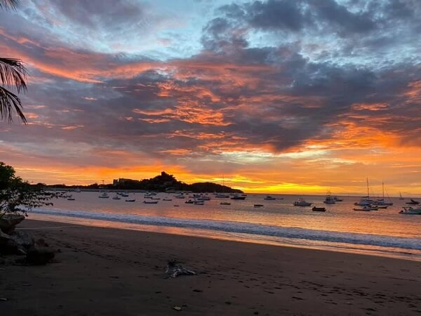 Beautiful orange and red sunset over the Playa Flamingo marina in Costa Rica.