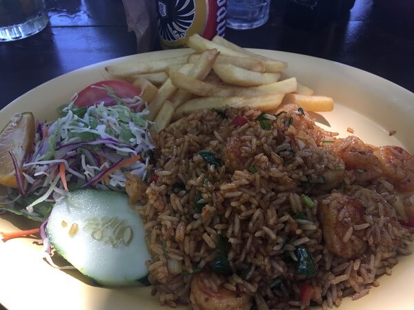 Small salad, crispy french fries with rice that was overly saturated with butter and small shrimp.