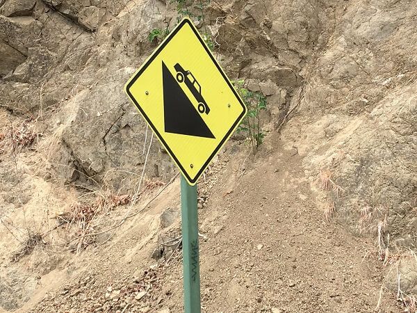 Steep road warning sign