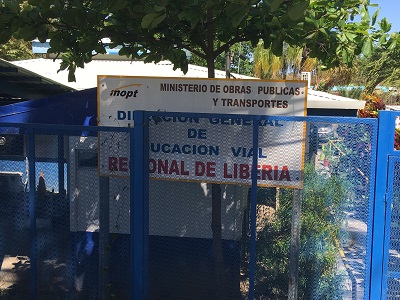 The entrance to the Costa Rica MOPT office can be identified by this sign.
