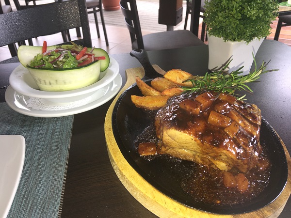 Tender and moist pork ribs with rosemary spears along with potato wedges and a crisp salad.