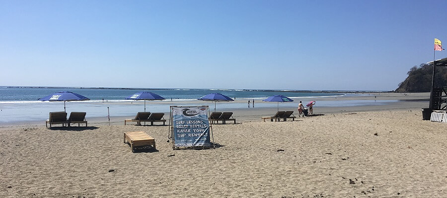 Lounge chairs lined up along the beach in Samara.