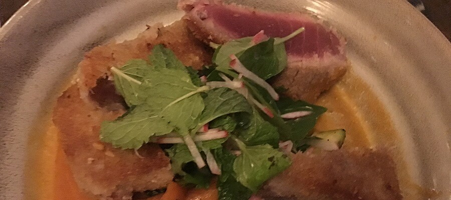 Sentido Norte's panko crusted ahi with fresh greens.