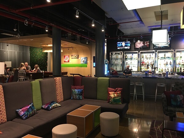 The colorful lobby and bar area at the Aloft San Jose